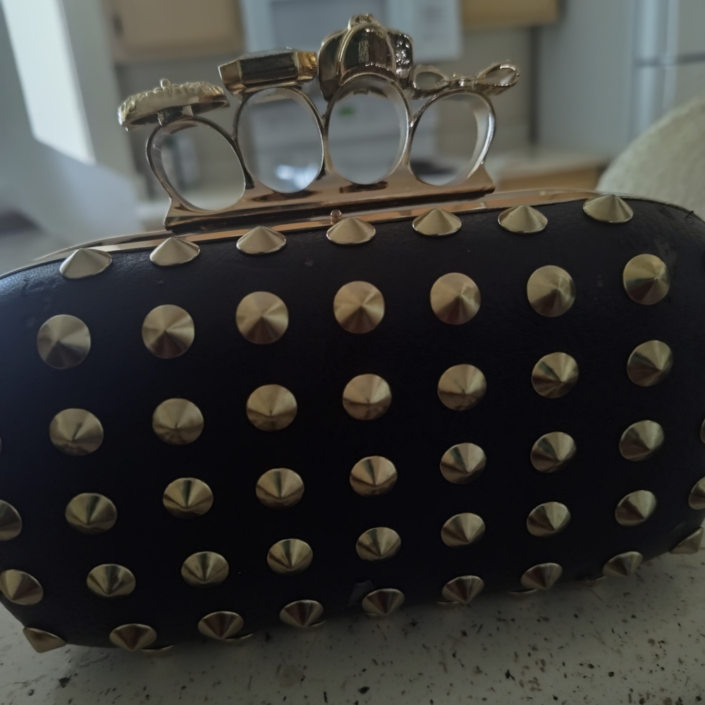 Chic Black Studded Clutch with Gold Accents